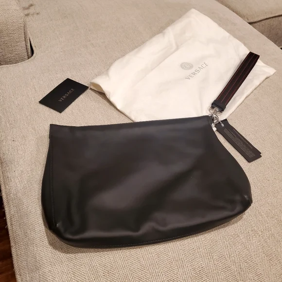 Brand new Versace leather clutch wrislet